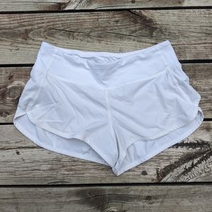 White Lululemon athletic shorts